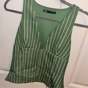 Worn once green and white striped tank top! Very cute and flattering.